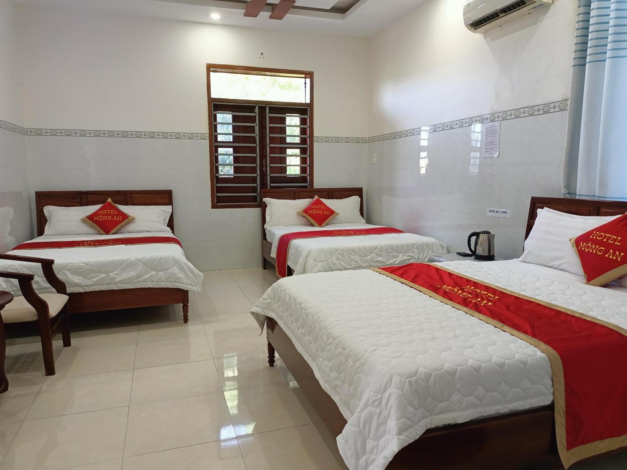 Khach San Mong An Hotel Vinh Hy Bagian luar foto